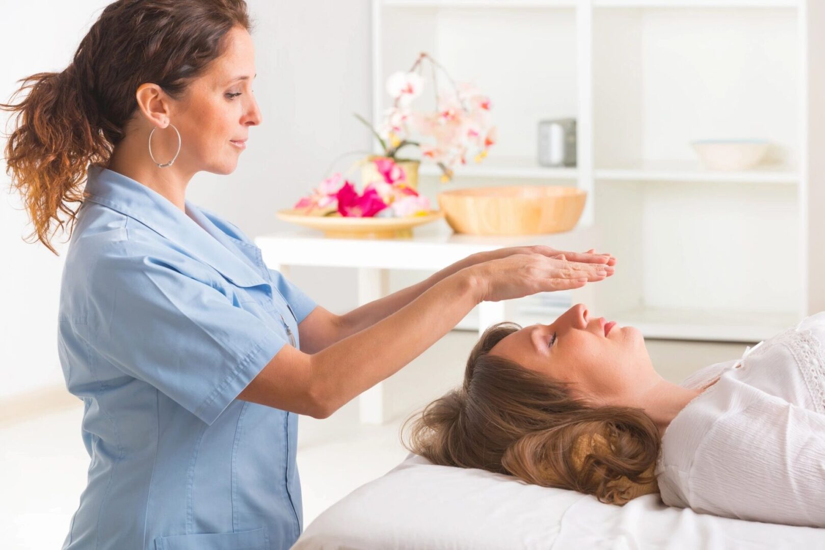 A woman is getting her hands up to the sky.